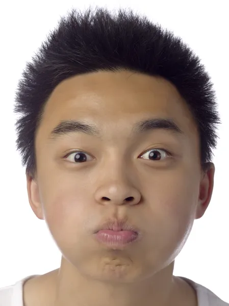 Genç adam komik bir yüz mimik — Stok fotoğraf