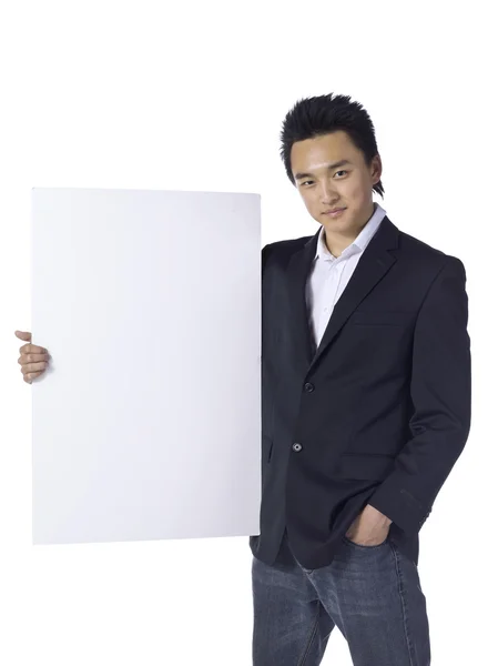 Young male holding a board — Stock Photo, Image