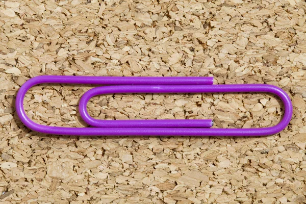 Purple paperclip — Stock fotografie