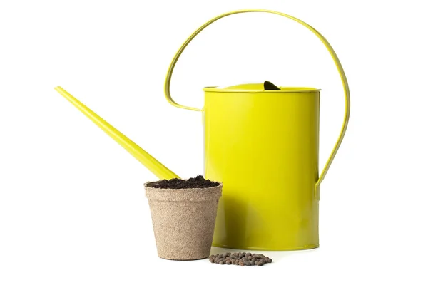 Watering can and pot — Stock Photo, Image