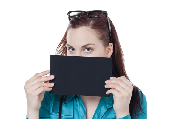 A woman covering her face by empty cardboard — Stock Photo, Image