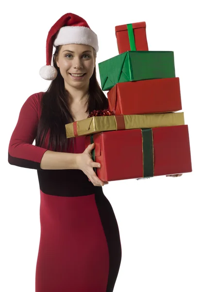 Bela senhora vestindo Santa traje segurando presentes — Fotografia de Stock
