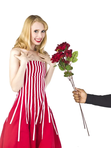 Beautiful woman receiving red roses — Stock Photo, Image