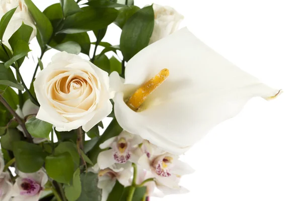 Calla lilies roses and cymbidium orchids — Stock Photo, Image