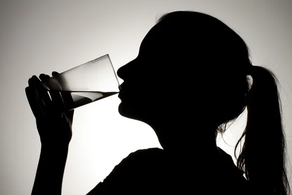 Female drinking water — Stock Photo, Image