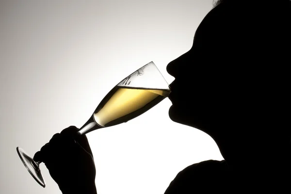 Image of a person drinking champagne — Stock Photo, Image