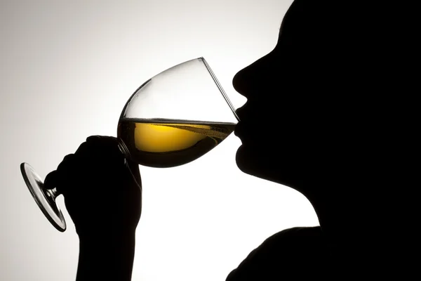 Person drinking wine Stock Image