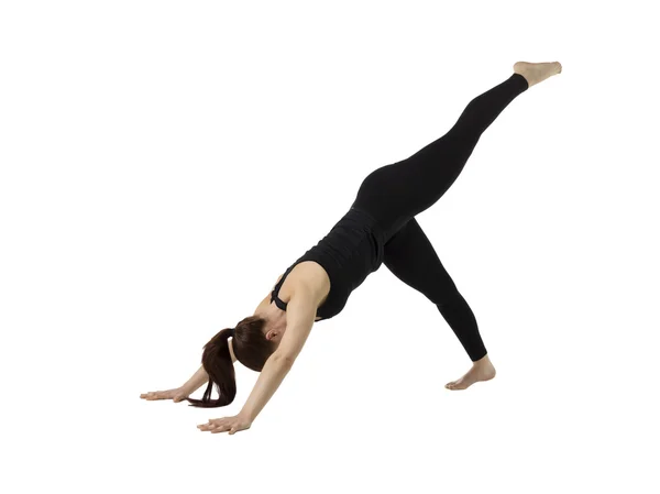 Jeune femme pratiquant l'exercice de yoga — Photo