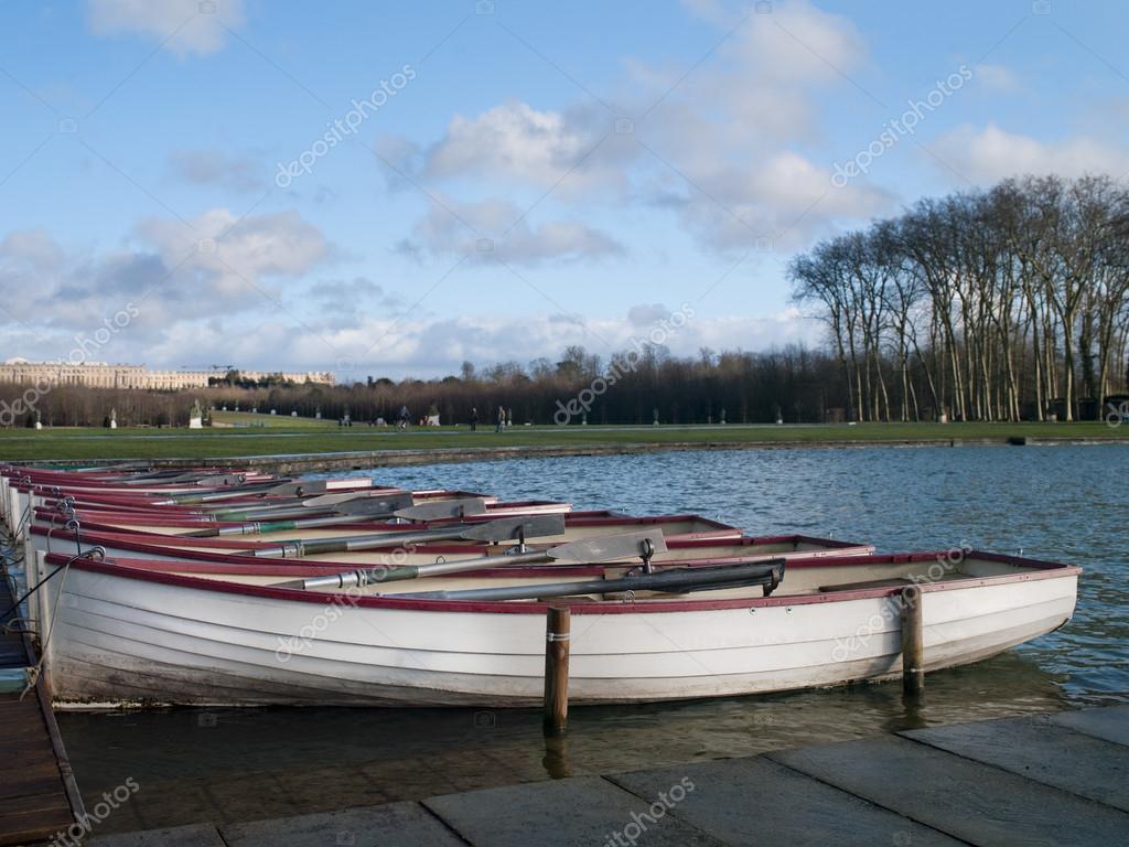 Row boats and palace of versailles — Stock Photo © kozzi2 19239827