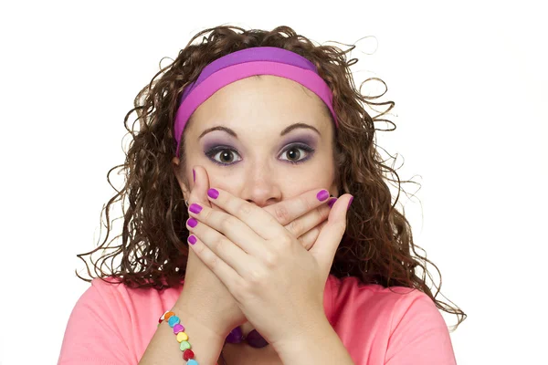 Girl in neon clasps hands over mouth — Stock Photo, Image