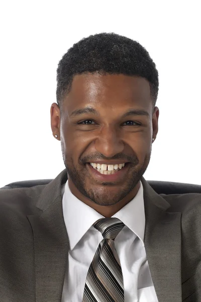 Hombre de negocios afroamericano en traje sonriente —  Fotos de Stock