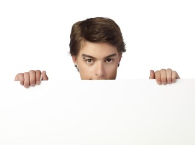 handsome man hiding on a white cardboard