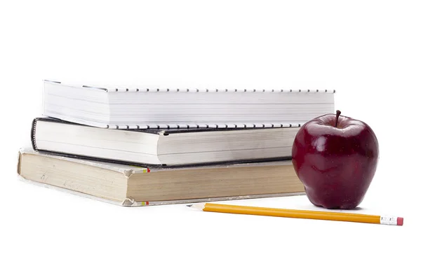 Okul öğeleri ve bir elma — Stok fotoğraf
