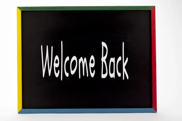 Welcome back written on slate board — Stock Photo, Image