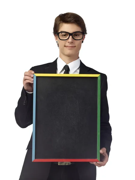 Iyi görünümlü bir adam bir kara tahta holding — Stok fotoğraf
