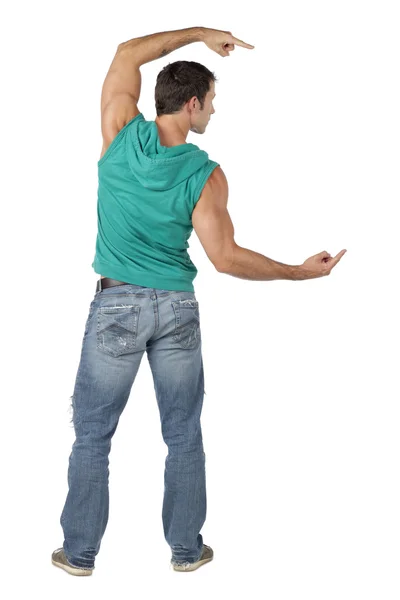 Muscular dancer pointing to the side — Stock Photo, Image