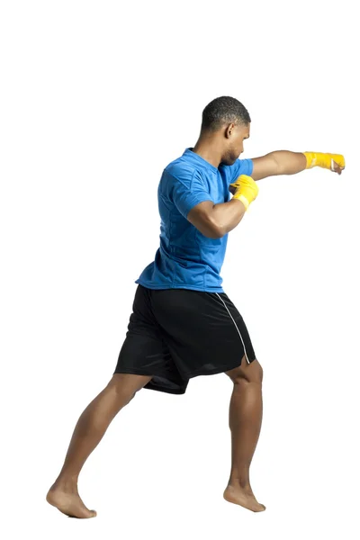 Punching male boxer — Stock Photo, Image