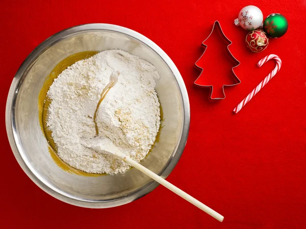 Overhead view of flour and chocolate syrup with spatula in steel — Stock Photo, Image