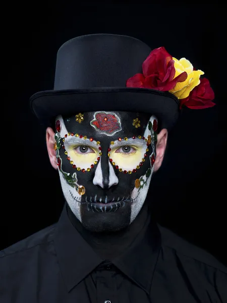 Portrait of a scary man wearing sugar skull make up and hat — Stock Photo, Image