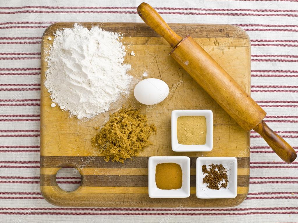 top view of cake ingredient and rolling pin on kitchen worktop
