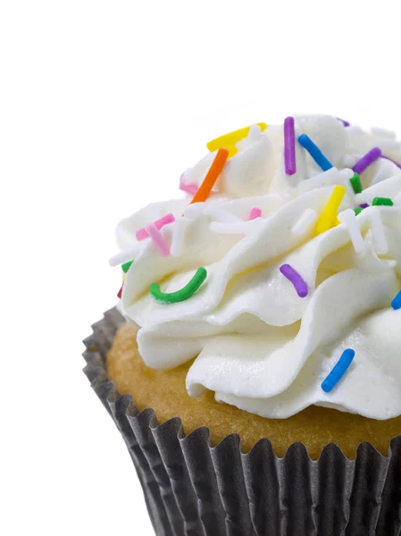 Cropped image of cupcake with sprinkle Royalty Free Stock Photos