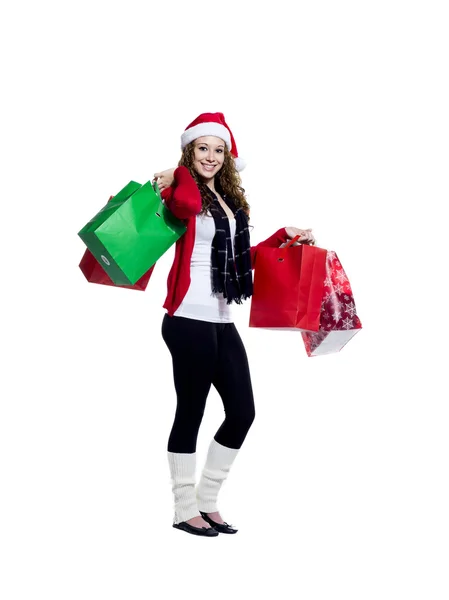 Portret van een mooie jonge vrouw uitvoering shopping tassen — Stockfoto