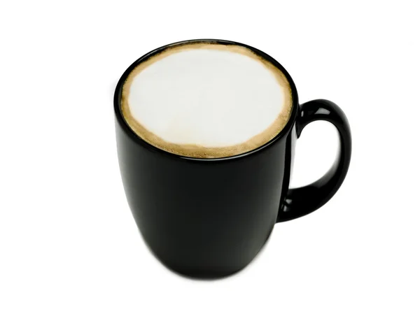 Cappuccino im schwarzen Becher — Stockfoto