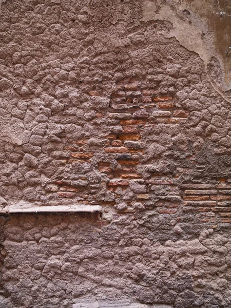 Brick wall covered with cement — Stock Photo, Image