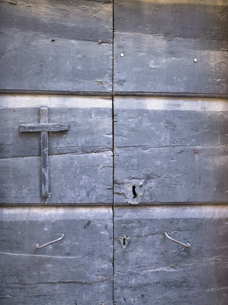 Makro bilden av en dörr och cross — Stockfoto