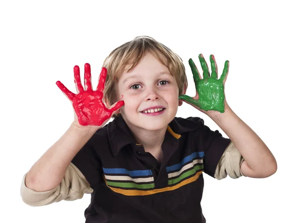 Blond pojke med målade händer — Stockfoto