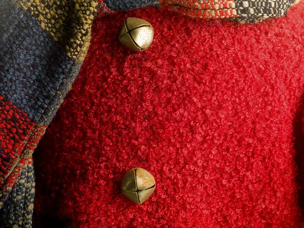 Close up shot of red sweater with metal button — Stock Photo, Image