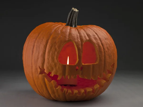 Lighted halloween pumpkin — Stock Photo, Image