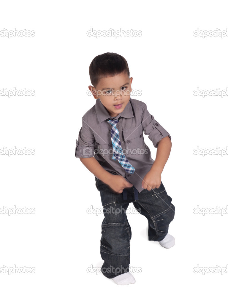 image of a little boy dancing looking at the camera