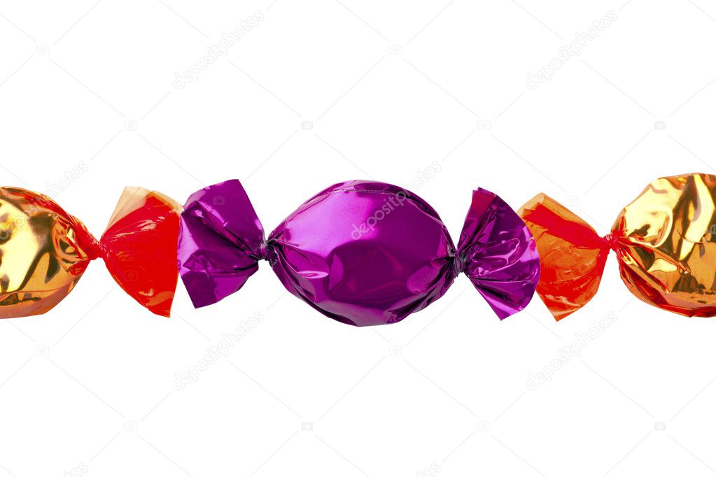Purple hard candy in between golden hard candy