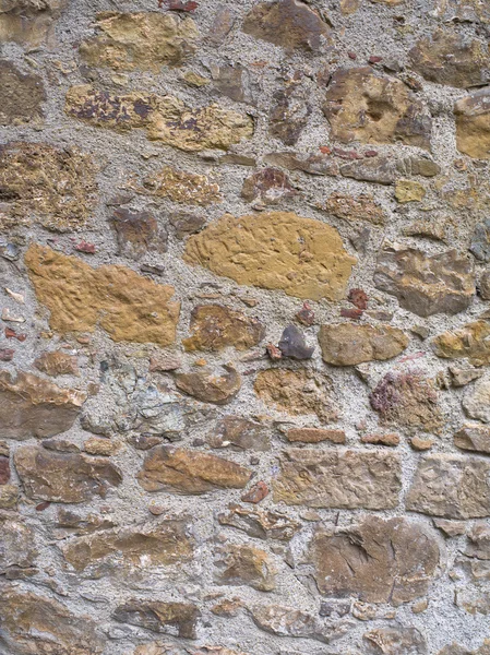 Oude bakstenen en stenen muur — Stockfoto