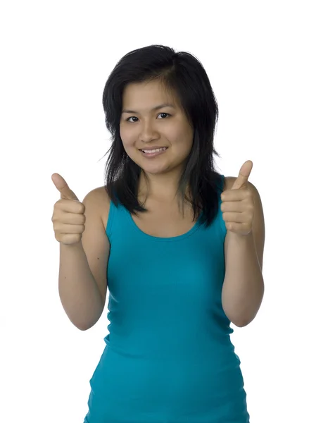 Sonriente joven mujer gesto pulgares hacia arriba — Foto de Stock