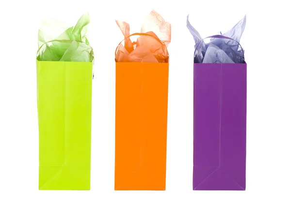 Tres bolsas con papel de seda — Foto de Stock