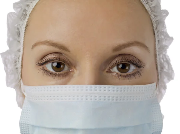 Female nurse with medical mask — Stock Photo, Image