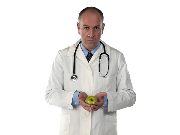 657 portrait view of a doctor holding an apple — Stock Photo, Image