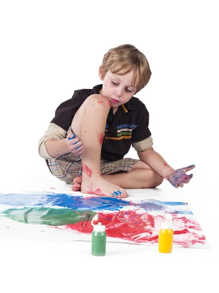 High angle view of a elementary boy doing painting — Stock Photo, Image