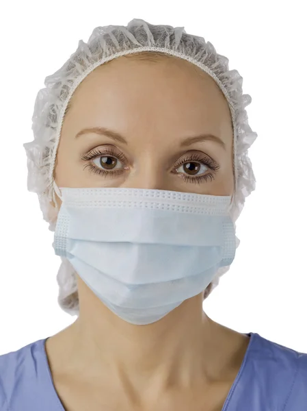 Vrouwelijke verpleegster dragen medische masker — Stockfoto