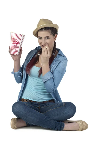 Pretty woman eating popcorn — Stock Photo, Image