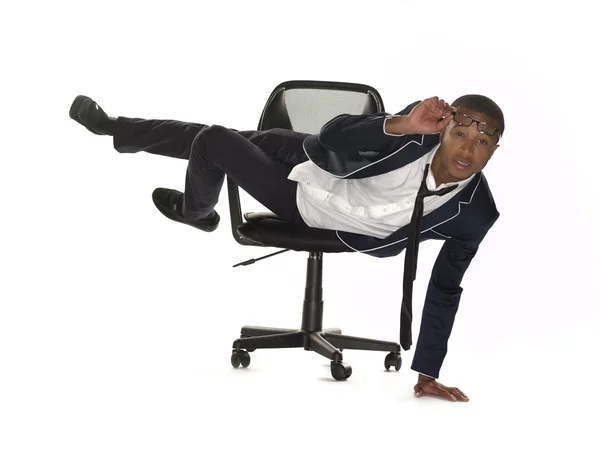 373 view of a businessman leaning on chair and adjusting spectac — Stock Photo, Image