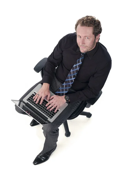 Handsome young doctor working on a laptop Stock Picture