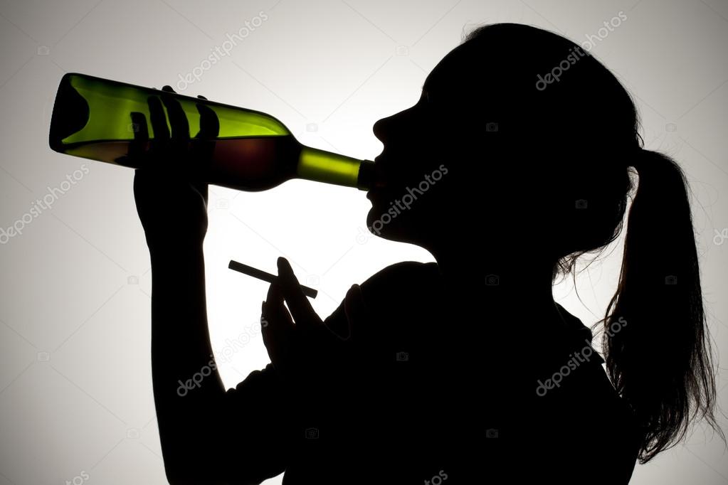 378 silhouette of woman drinking wine with cigarette