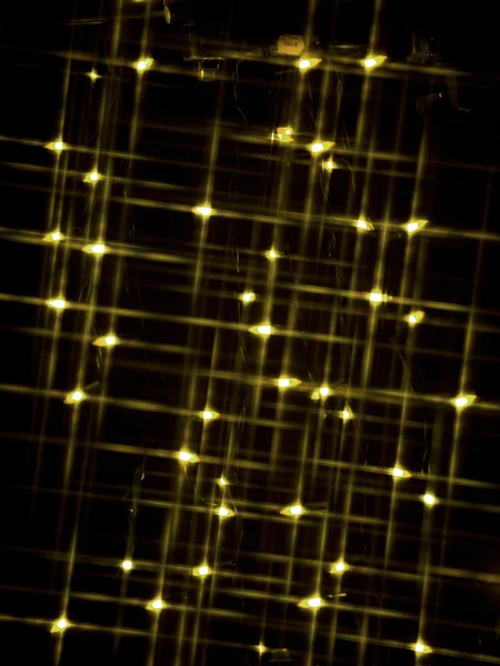 562 defokussiertes Bild gelber Neonlichter — Stockfoto
