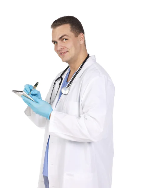 Smiling young doctor making reports — Stock Photo, Image
