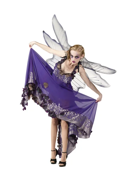 Beautiful young fairy holding her dress — Stock Photo, Image