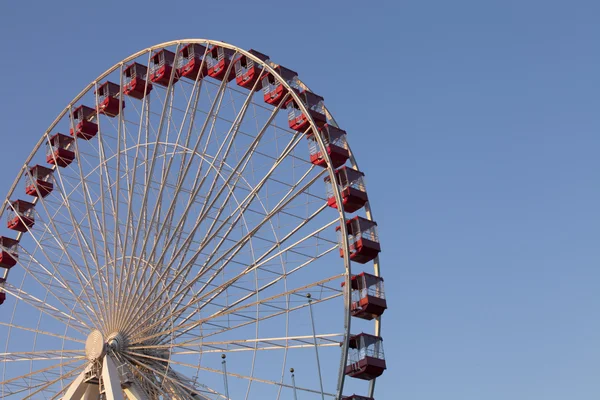 Low angle view of ferris wheel against clear sky Royalty Free Stock Images