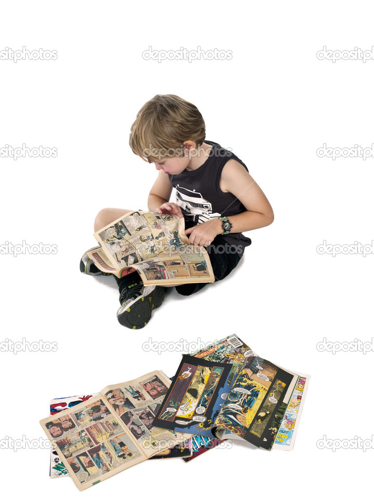 boy reading comic book